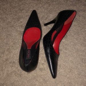 Lightly worn Escada 3 inch snake skin heels.